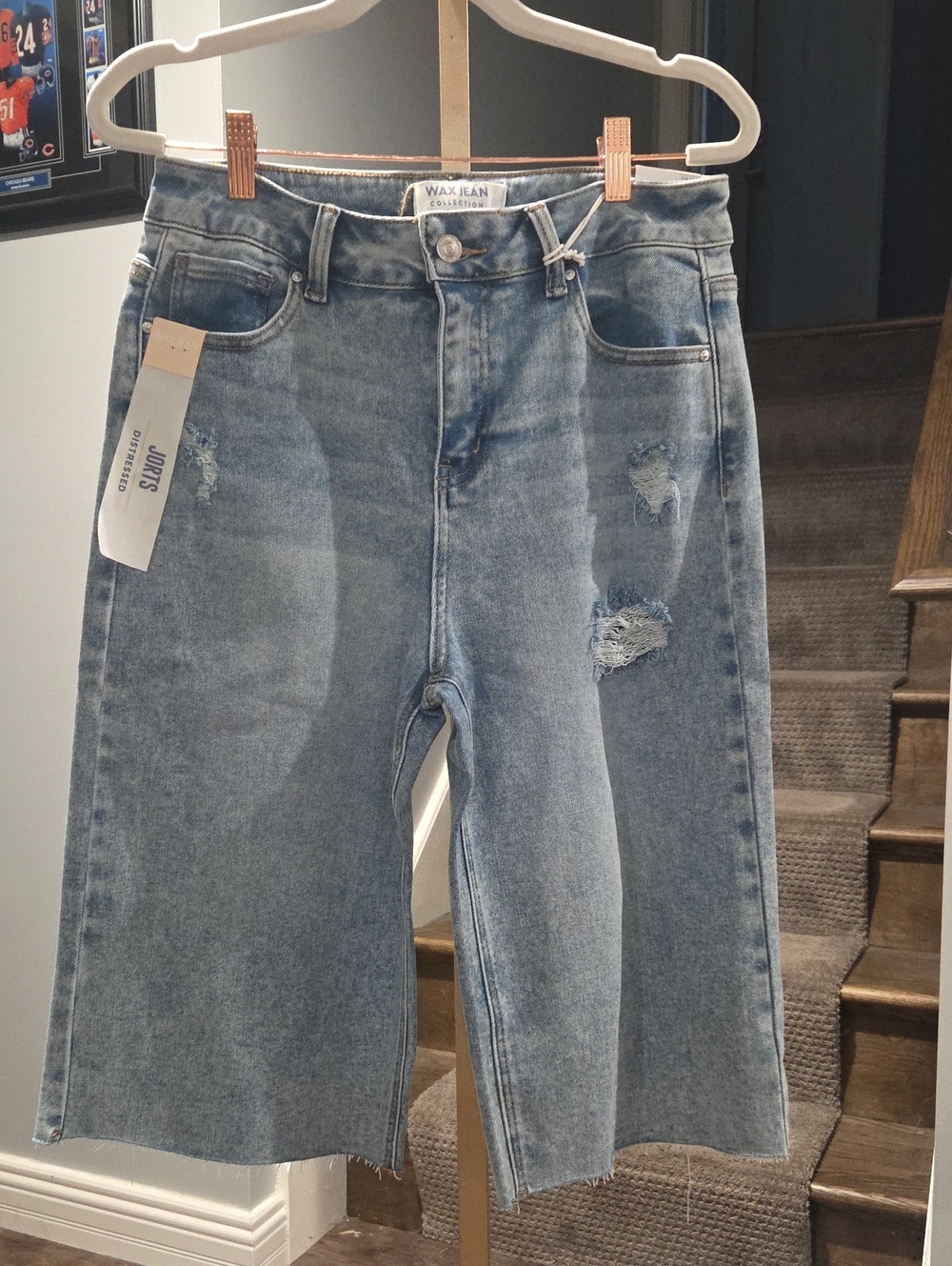 Woman's Light Blue Distressed Denim Shorts